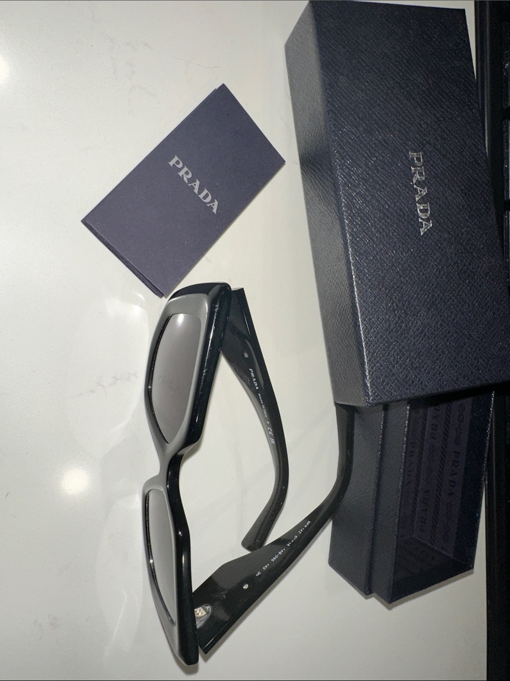 Prada Black womens Rectangular Sunglasses with Dark Lenses